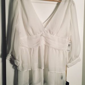 Women’s new blouse by Essentials with tags